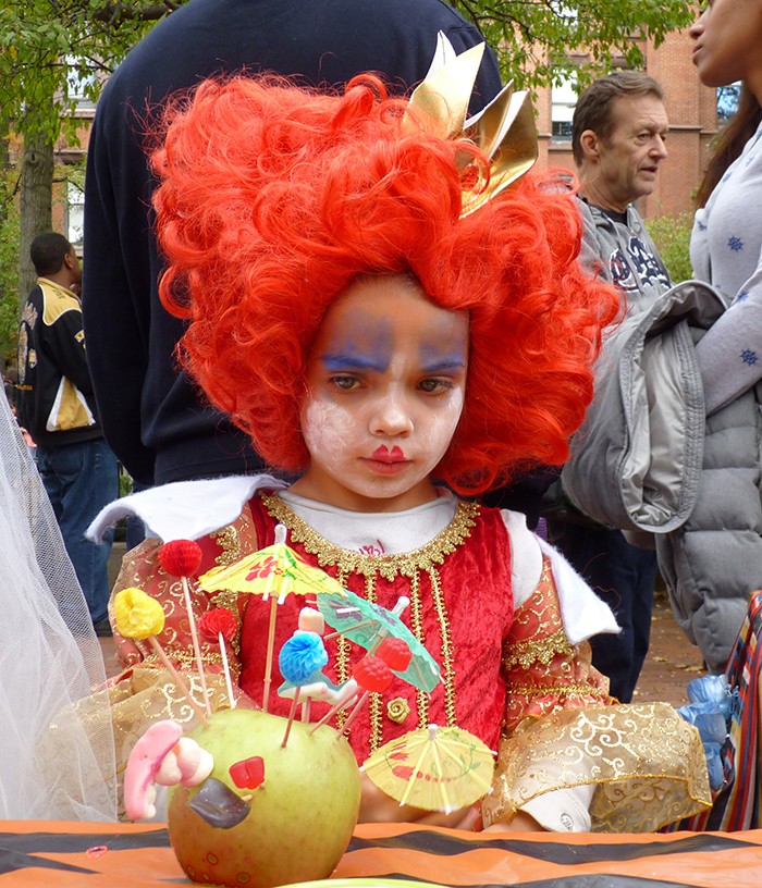 The Red Queen studies her fruit decorating options at Packer's Pumpkin Patch in Brooklyn Heights. This year’s Pumpkin Patch takes place on Sunday, Oct. 25.  Photo by Mary Frost