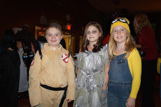 Students used a great deal of creativity when coming up with ideas for costumes. Here, we have a Ghostbuster, a zombie, and a Minion. Photos courtesy of Saint Patrick Catholic Academy