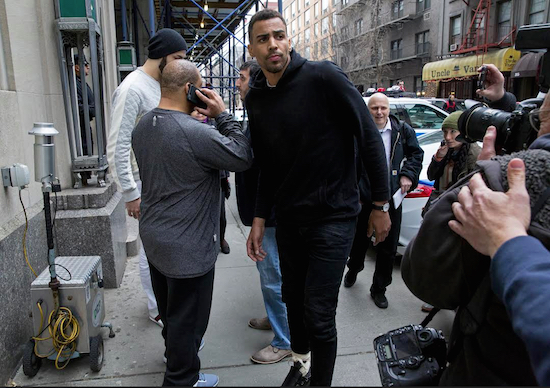 In this photo from April 8, Atlanta Hawks forward Thabo Sefolosha, center, leaves a courthouse in New York. Sefolosha is fighting charges that he blocked officers from setting up a crime scene following the stabbing of Indiana Pacers' Chris Copeland outside a trendy Manhattan nightclub in April. AP Photo/Craig Ruttle, File