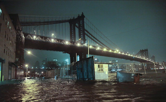Streets are flooded under the Manhattan Bridge in DUMBO on Oct. 29, 2012, in the wake of Superstorm Sandy, which caused multiple fatalities, halted mass transit and cut power to more than 6 million homes and businesses.  AP Photos/Bebeto Matthews