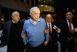 Jose Maria Marin, center, leaves federal court Brooklyn on Tuesday. The Brazilian FIFA official who was a key organizer of the 2014 World Cup in his home country pleaded not guilty on Tuesday to U.S. charges stemming from a sprawling bribery case that has scandalized the soccer world. AP Photo/Mary Altaffer