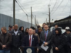 Elected officials gathered at the site where a waste transfer station is under construction to call on the city to halt the construction. Photo courtesy of Assemblymember William Colton’s office