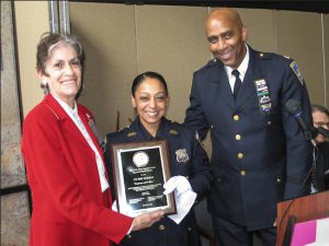 Hon. Laura Lee Jacobson (left) and Capt. Kevin Gatherer (right) presented court officer Bibi Mohabier with the Employee of the Year Award of the Kings County Supreme Court during a ceremony on Thursday. Eagle photo by Mario Belluomo
