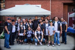 Members of the Domestic Disorder Auto Club of Brooklyn and their families and friends are hoping the toy drive results in a lot of donations. Photo courtesy of the Auto Club