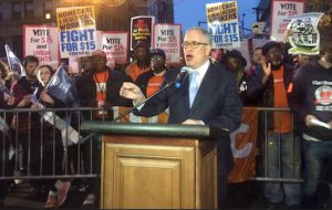 Fast-food workers, who recently won a $15 hourly wage in New York state, led a march and rally on Court Street in Downtown Brooklyn at the crack of dawn on Tuesday to demand $15 and the right to unionize for all working people. Shown: NYC Comptroller Scott Stringer, who has been a supporter of a $15 minimum wage, speaks out at the rally, which took place outside the McDonalds at 82 Court St. Photo courtesy of the Office of the Comptroller