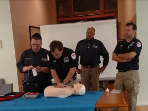 Experts demonstrate how to perform CPR. Photo courtesy of Assemblymember Nicole Malliotakis’s office
