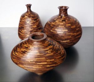 Hand-shaped vessels in the "Stacked" collection of salvaged walnut with a custom oil/polyurethane polished finish by Williamsburg-based artist Richard Haining. Photos courtesy of J M Byington & Associates, Inc.
