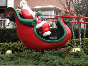 Jolly Old Saint Nick touches down in Bay Ridge. Eagle photos by Lore Croghan