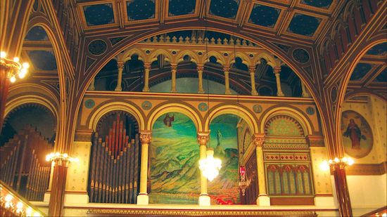 The mural depicting the Virgin Mary’s protection of Lebanon is visible above the altar at Our Lady of Lebanon Maronite Cathedral, which will host a new tradition in Downtown Brooklyn — the Brooklyn Heights Clergy Association’s first annual interfaith Thanksgiving service — on Nov. 22. Eagle photo by Francesca N. Tate