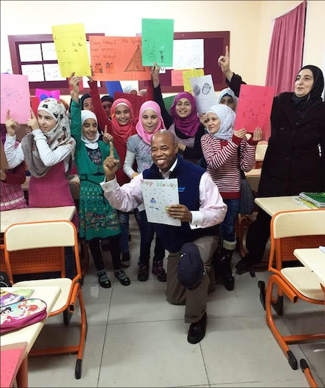 Borough President Eric Adams visited a group of Syrian girls at the Nizip refugee camp, located near the Syrian border, to donate clothes and deliver holiday greetings created by students at P.S. 133 in Park Slope. Photo by Ama Dwimoh/Brooklyn BP’s Office
