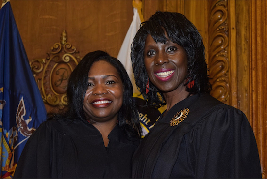 A ceremony was held for Justice Genine D. Edwards (left) as she was officially sworn in as the newest justice of the Supreme Court of the State of New York by Justice Sylvia G. Ash at Borough Hall on Monday. Eagle photos by Rob Abruzzese.