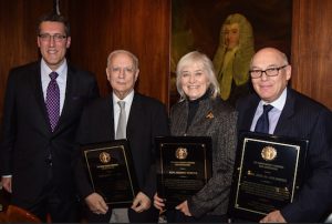 The Kings County Criminal Bar Association honored three retiring justices during its annual holiday party on Thursday night. Pictured from left: KCCBA President Michael Farkas, Hon. Albert Tomei, Hon. Sheryl Parker and Hon. Joel Goldberg. Eagle photos by Rob Abruzzese