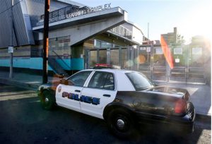 A police car is parked outside of Miguel Contreras Learning Complex, Tuesday in Los Angeles. All schools in the vast Los Angeles Unified School District, the nation's second largest, have been ordered closed due to an electronic threat Tuesday. AP Photo/Ringo H.W. Chiu