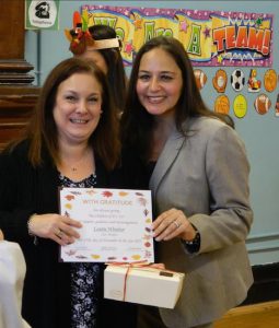 Community Education Council President Laurie Windsor (left) accepts a ‘Day of Gratitude” award from P.S. 127 Principal Agatha Alicandro. Photos courtesy of Stefanie Meola/P.S 127