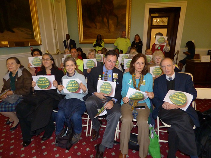Members of the advocacy group Citizens Defending Libraries. The group was co-founded by Michael D. D. White (front row, third from right) and Carolyn McIntyre (front row, second from right).