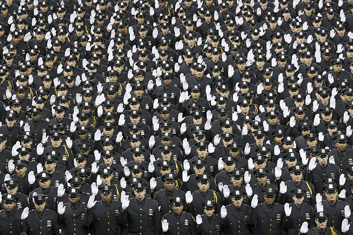 Police Commissioner Bratton and Mayor Bill de Blasio officiated over the graduation of 1,123 new police officers on Tuesday at Madison Square Garden. This year’s crop of recruits has received more training and technology than any previous class. AP photo by Mary Altaffer