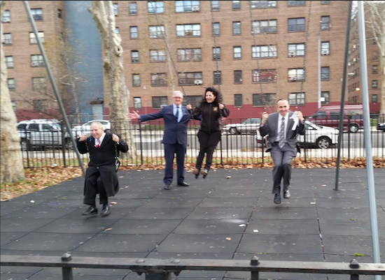 Assemblymember Bill Colton, state Sen. Diane Savino and Councilmember Mark Treyger (left to right) enjoy the swings in the playground. Also pictured is First Deputy Parks Commissioner Liam Kavanagh. Photo courtesy of Treyger’s office