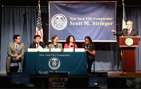 City Comptroller Scott Stringer, at the podium, introduces some of his staffers, from left: Brian Cook, director of the Bureau of Economic Development: Seunghwan Kim, assistant comptroller for law and adjustment; Marjorie Landa, deputy comptroller for audit; Lisa Flores, deputy comptroller for contracts and procurement; and Camille Joseph, deputy comptroller for public affairs. Photo courtesy of Comptroller Stringer’s office