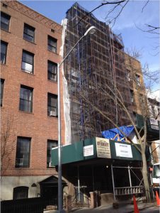 A single-family home conversion is in the works at 146 Willow St., the building shrouded by construction netting. Eagle photo by Lore Croghan