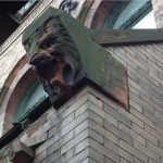 This wide-eyed beast adorns the former 75th Police Precinct Station House. Eagle photos by Lore Croghan