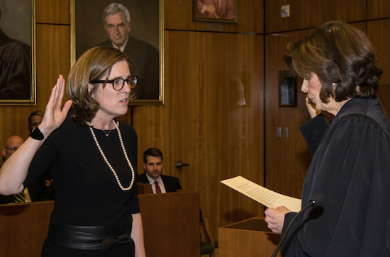 Ann M. Donnelly (left) is sworn in by Chief Judge Carol Bagley Amon as the 61st judge in the history of the Eastern District of New York during an investiture ceremony at the federal courthouse in Brooklyn on Friday. Eagle photos by Rob Abruzzese