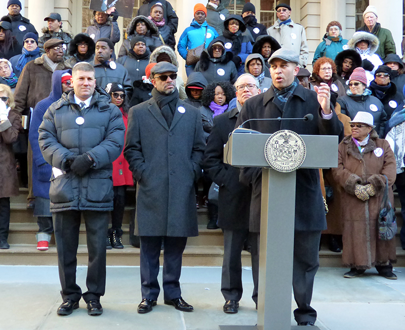 From right: U.S. Rep. Hakeem Jeffries, at podium, NYC Comptroller Scott Stringer, Rev. David Brawley, co-chair of Metro IAF and others. Photo by Mary Frost