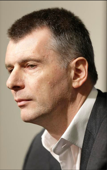 Nets owner Mikhail Prokhorov can only sit and watch as his team continues to lose games at home, dropping to 8-18 overall at the Barclays Center this season with Tuesday’s 102-98 defeat to Miami. AP photo