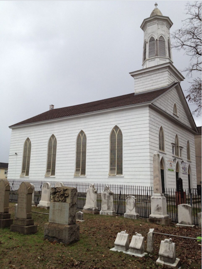 East New York has numerous historic buildings, such as landmarked New Lots Reformed Church, which was built in the 1820s. Eagle photos by Lore Croghan