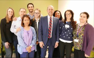 The NYU Lutheran ALS Center team, led by Dr. Anthony Geraci (fourth from right), stands ready to address the health needs for people with ALS. Photo courtesy of NYU Lutheran