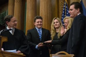 Justice Pamela L. Fisher (second from the right) was sworn in as the newest justice of the Kings County Supreme Court by Hon. Mark Partnow (left) with her son Arthur Decker, daughter Cameron Decker and husband Steven Decker (right) by her side. Photo by Rob Abruzzese.