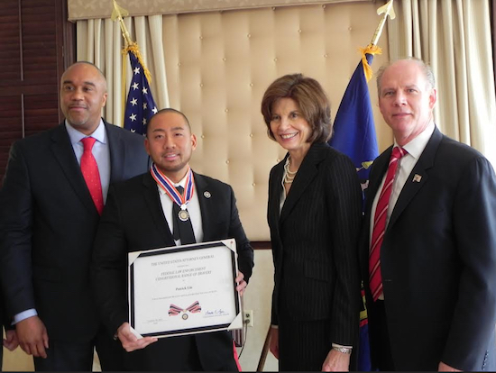 Deputy U.S. Marshal Patrick Lin (second from left) is congratulated by U.S. Attorney Robert Capers, Hon. Carol Bagley Amon and U.S. Rep. Dan Donovan (left to right). Eagle photos by Paula Katinas