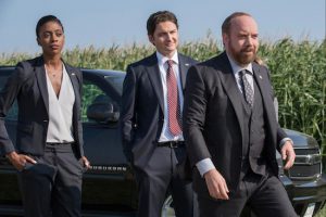 From left: Condola Rashad as Kate Sacker, Toby Leonard Moore as Bryan Connerty and Paul Giamatti as Chuck Rhoades in season one of the TV series "Billions." The television show premieres Sunday, Jan. 17, at 10 p.m. EST.  Jeff Neumann/Showtime via AP