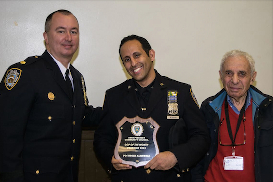 Crime is down in the 84th Precinct thanks to cops like Ywoeh Alrubyai (center), who was named the 84th Precinct Community Council’s Cop of the Month for his effort in helping to get a loaded gun off the streets. Deputy Inspector Sergio Centa (left) and 84th Precinct Community Council President Leslie Lewis presented Alrubyai with his award. Eagle photo by Rob Abruzzese