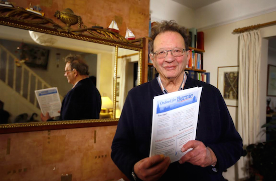 Larry Sanders holds political leaflets at his home in Oxford, England, this past Monday. He is helping out his little brother Bernie with a small electoral campaign on the other side of the Atlantic. AP Photo/Kirsty Wigglesworth