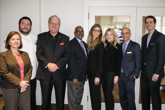 The New York Marriott at the Brooklyn Bridge donated 1,600 plates, 100 pillowcases and 100 blankets to formerly homeless veterans whom the mayor’s office has found homes for. Pictured from left: Maryann Santora and Robert Mirabelle from the Marriott, Edward Schloeman, Tommie Lloyd and Nicole Branca of the Mayor’s Office of Veterans’ Affairs, Dr. Lois Lee of Children of the Night, Sam Ibrahim and Mark Czerniak of the Marriott. Eagle photos by Rob Abruzzese