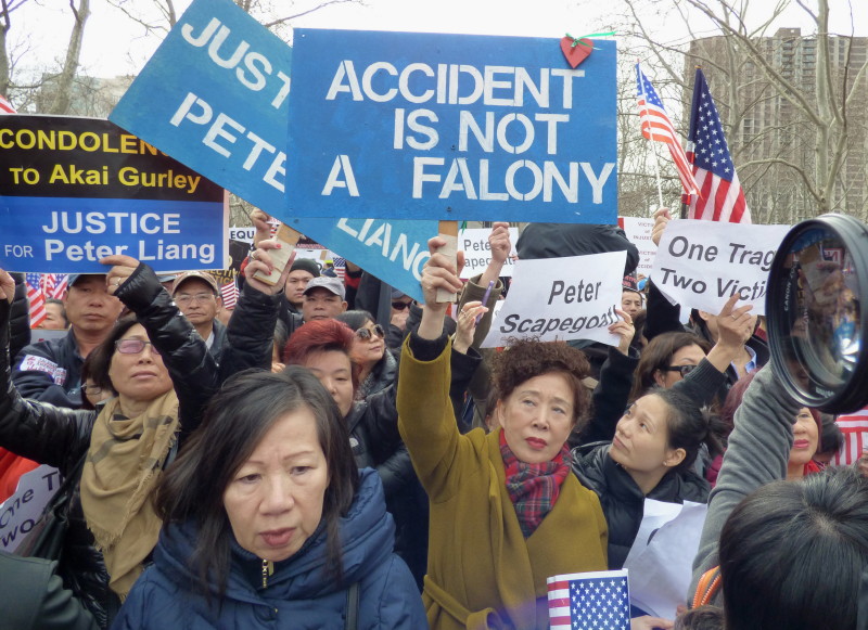 Ten to 15,000 protesters, the vast majority Asian American, poured into Cadman Plaza Park in Downtown Brooklyn on Saturday to support NYPD Officer Peter Liang. Photos by Mary Frost