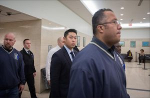 NYPD Officer Peter Liang, center, arrives Tuesday for closing arguments at his Brooklyn Supreme Court trial in the shooting death of Akai Gurley. AP Photo/Bryan R. Smith