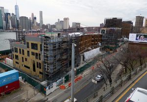 The Brooklyn Heights Association and the preservationist group Save The View Now argued in court on Thursday that a section of the Pierhouse penthouse in Brooklyn Bridge Park (shown above to the left) juts into the protected Scenic View District and should be trimmed. Photo by Mary Frost
