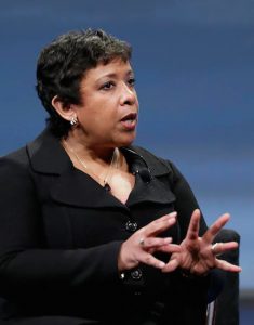 U.S. Attorney General Loretta Lynch gestures while taking part in an armchair discussion at the RSA Conference Tuesday in San Francisco. Law enforcement and technology companies at odds over encryption and other issues of digital privacy need to have an "open dialogue" to try to resolve their differences, Lynch asserted. Lynch argued that the two sides need to communicate and "draw upon each other's resources" even if they "won't be locked in perpetual and perfect agreement." AP Photo/Eric Risberg