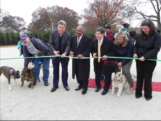 Bay Ridge lawmakers, Parks Department officials and civic leaders joined together to reopen a dog run in Dyker Beach Park in 2014 to give canines a safe play to play. Local pet owners are alarmed at reports of animal poisonings. Eagle file photo by Paula Katinas