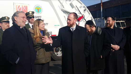Councilmember David G. Greenfield (right) shares a joke with Assemblymember Dov Hikind (left) as Sanitation Commissioner Kathryn Garcia looks on. Photo courtesy of Greenfield’s office