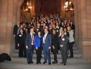 The Brooklyn Chamber of Commerce delegation stands on the grand staircase inside the State Capitol in Albany on Monday after a successful day of meetings with top officials in the Cuomo Administration and with key legislators. Eagle photo by Paula Katinas