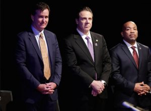 New York Gov. Andrew Cuomo, center, is pictured with Senate Majority Leader John Flanagan (R-Smithtown), left, and Assembly Speaker Carl Heastie (D-Bronx), in January, before he delivered his State of the State address and executive budget proposal at the Empire State Plaza Convention Center in Albany. AP Photo/Mike Groll, File