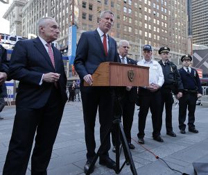 NYC Police Commissioner William Bratton and Mayor Bill de Blasio on Wednesday unveiled new initiatives to track and combat slashings and stabbings. Shown: De Blasio and Bratton address security at a separate news conference on Tuesday following the Brussels bombings. AP Photo/Frank Franklin II