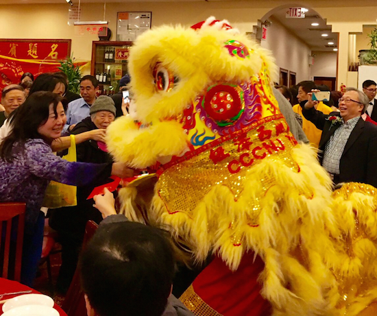 The Lion Dance is part of the Hainan Association's Chinese New Year celebration. Eagle photos by Lore Croghan