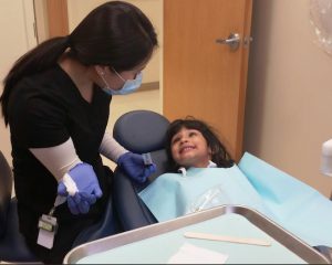 An Interfaith dental resident checks out a P.S. 243 elementary school student’s beautiful smile. Photos courtesy of Interfaith Medical Center
