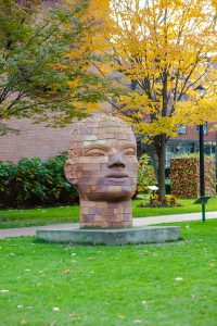 “Brickhead Yemanga” by James Tyler, shown here, is one of more than 50 massive art works that grace Pratt Institute’s 25-acre sculpture park.