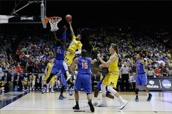After  helping his team get past Tulsa on Wednesday night with this soaring scoop to the hoop, Muhammad-Ali Abdur Rhakman and the rest of the Michigan Wolverines will battle rival Notre Dame Friday night during the opening round of the NCAA Tournament at Downtown’s Barclays Center. AP photo