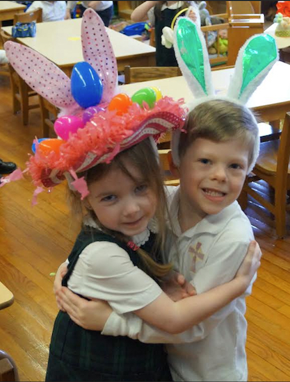 Kids congratulate each other on their Easter hat creativity. Photos courtesy of Saint Patrick Catholic Academy