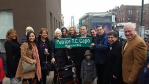 Councilmember Vincent Gentile (second from right) and state Sen. Marty Golden (right) joined members of Patrice Capo’s family to display the street sign honoring her. At left is Assemblymember Pam Harris. Photo courtesy of Gentile’s office